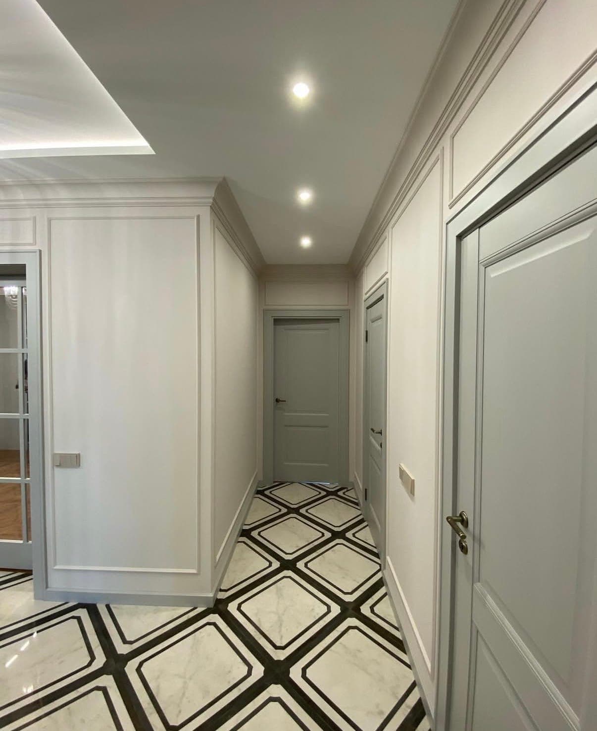 Carrelage — Sol en marbre à filets noirs · réalisation ARDMUPRO